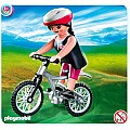 Woman On Mountain Bike