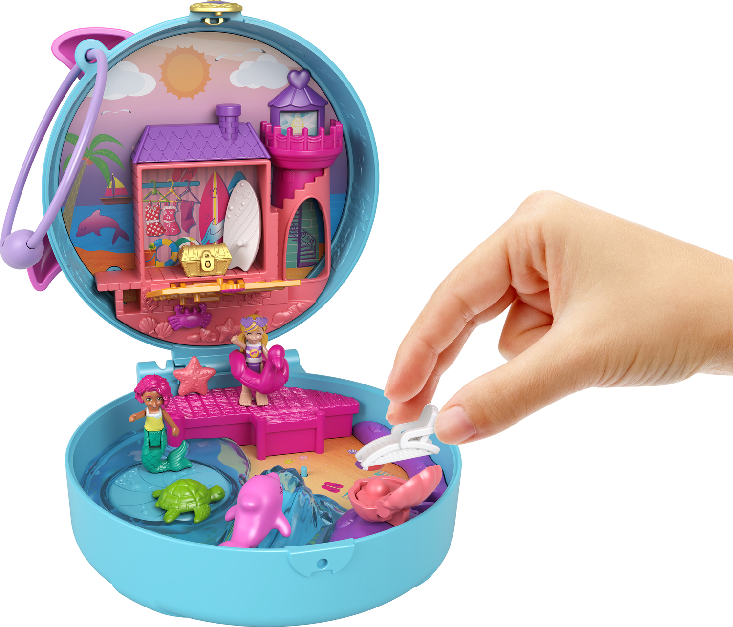 For the last Polly Pocket I own, we have a cute dolphin compact