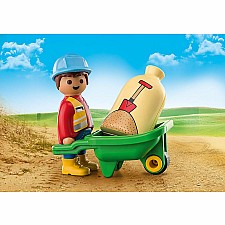 Construction Worker With Wheelbarrow